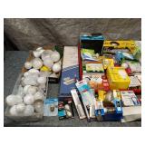 Collection of Various Light Bulbs and Lighting Accessories