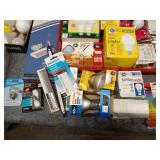 Collection of Various Light Bulbs and Lighting Accessories