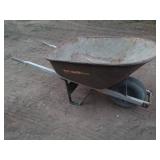Used Rusted Metal Wheelbarrow with Pneumatic Tire