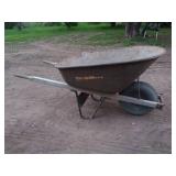 Used Rusted Metal Wheelbarrow with Pneumatic Tire