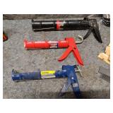 Collection of Caulking Guns and Sealant Tubes