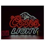 Large Coors Light neon sign with mountain