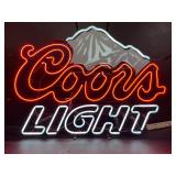 Large Coors Light neon sign with mountain
