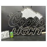 Large Coors Light neon sign with mountain