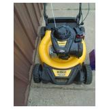 Dewalt rear wheel drive self propelled mower. Looks nearly new. Tested & works. As shown.