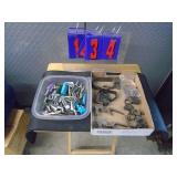 Flat of misc vintage trigger assemblies & archery broad heads & gun mats. As shown.