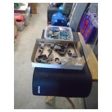 Flat of misc vintage trigger assemblies & archery broad heads & gun mats. As shown.