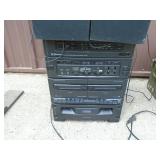 Emerson garage radio with speakers & remote. Works. As shown.