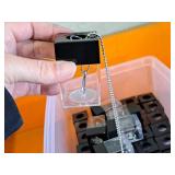 Lot of (1 Bin) Anti-Theft Pen Holders