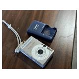 Canon Power Shot SD1000 Digital Elph 7.1 Megapixel 3x Zoom Digital Camera with Battery Charger
