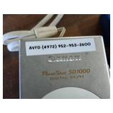 Canon Power Shot SD1000 Digital Elph 7.1 Megapixel 3x Zoom Digital Camera with Battery Charger