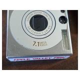 Canon Power Shot SD1000 Digital Elph 7.1 Megapixel 3x Zoom Digital Camera with Battery Charger