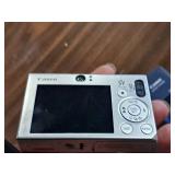 Canon Power Shot SD1000 Digital Elph 7.1 Megapixel 3x Zoom Digital Camera with Battery Charger