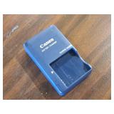 Canon Power Shot SD1000 Digital Elph 7.1 Megapixel 3x Zoom Digital Camera with Battery Charger