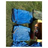 Set of Blue and Camouflage Tarps with Assorted Cords