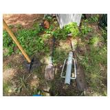 Group of Manual Garden Tools Including Post Hole Digger, Post Driver, and Tamper