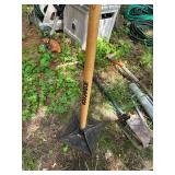 Group of Manual Garden Tools Including Post Hole Digger, Post Driver, and Tamper