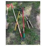 Collection of 12 Garden and Lawn Tools Including Shovels, Rakes, and Hoes