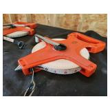 Open Reel Measuring Tapes with Orange Handles