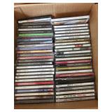 Assorted Collection of Music CDs Including Taylor Swift and John Denver