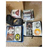 Extensive Collection of Music CDs and DVDs with Storage Cases