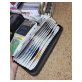 Extensive Collection of Music CDs and DVDs with Storage Cases