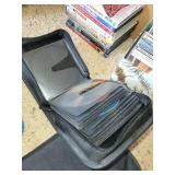 Extensive Collection of Music CDs and DVDs with Storage Cases