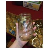 Collection of 34 Assorted Kerr and Ball Mason Jars with Lids