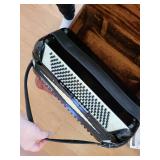 Titano Accordion with Case and Traficante Accordion Band Series Sheet Music