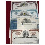 Collection of Vintage Stock Certificates from Various Companies