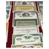 Collection of Vintage Stock Certificates from Various Companies