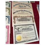 Collection of Vintage Stock Certificates from Various Companies