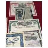 Collection of Vintage Stock Certificates Including Railroads and Airlines