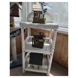 Collection of Rustic Garden Decor Including Birdhouses, Wind Chimes, and Signs