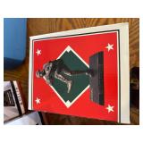 Collection of Minnesota Twins Memorabilia Including Apparel and Statues