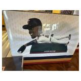 Collection of Minnesota Twins Memorabilia Including Apparel and Statues