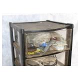 Black Plastic Storage Drawers with Assorted Hardware and Tools
