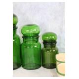 Collection of Vintage Green Glass Bottles and Canisters