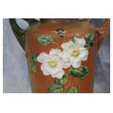 Set of 9 Roseville Pottery Pieces with Floral Design