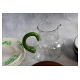 Vintage Kitchenware Collection with Plates, Pitchers, and Lidded Containers