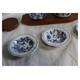 Vintage Kitchenware Collection with Plates, Pitchers, and Lidded Containers