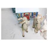 Assorted Holiday Decorations Including Santa Tin, Reindeer Figurines, and Candle Holders