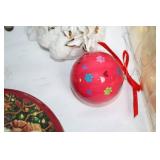 Assorted Holiday Decorations Including Santa Tin, Reindeer Figurines, and Candle Holders