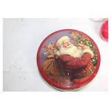 Assorted Holiday Decorations Including Santa Tin, Reindeer Figurines, and Candle Holders