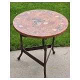 Charming Tuscan Plantation Accent Table with Iron Base and Faux Floral Leather Surface