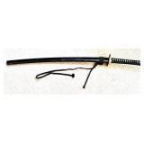 Decorative Katana Sword with Dragon Motif and Black Sheath
