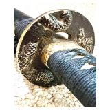 Decorative Katana Sword with Dragon Motif and Black Sheath
