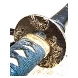 Decorative Katana Sword with Dragon Motif and Black Sheath