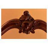 Antique Upholstered Wooden Chair with Carved Detail