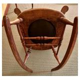 Vintage Oak Rocking Chair with Intricate Back
